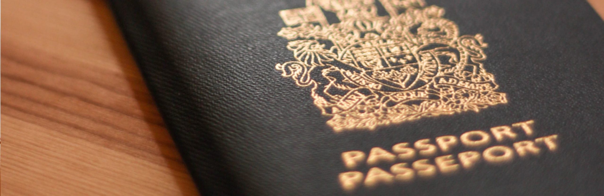 Passport and travel documents laid out on a table